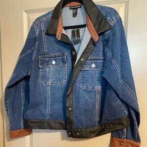 Denim jacket with faux leather trim